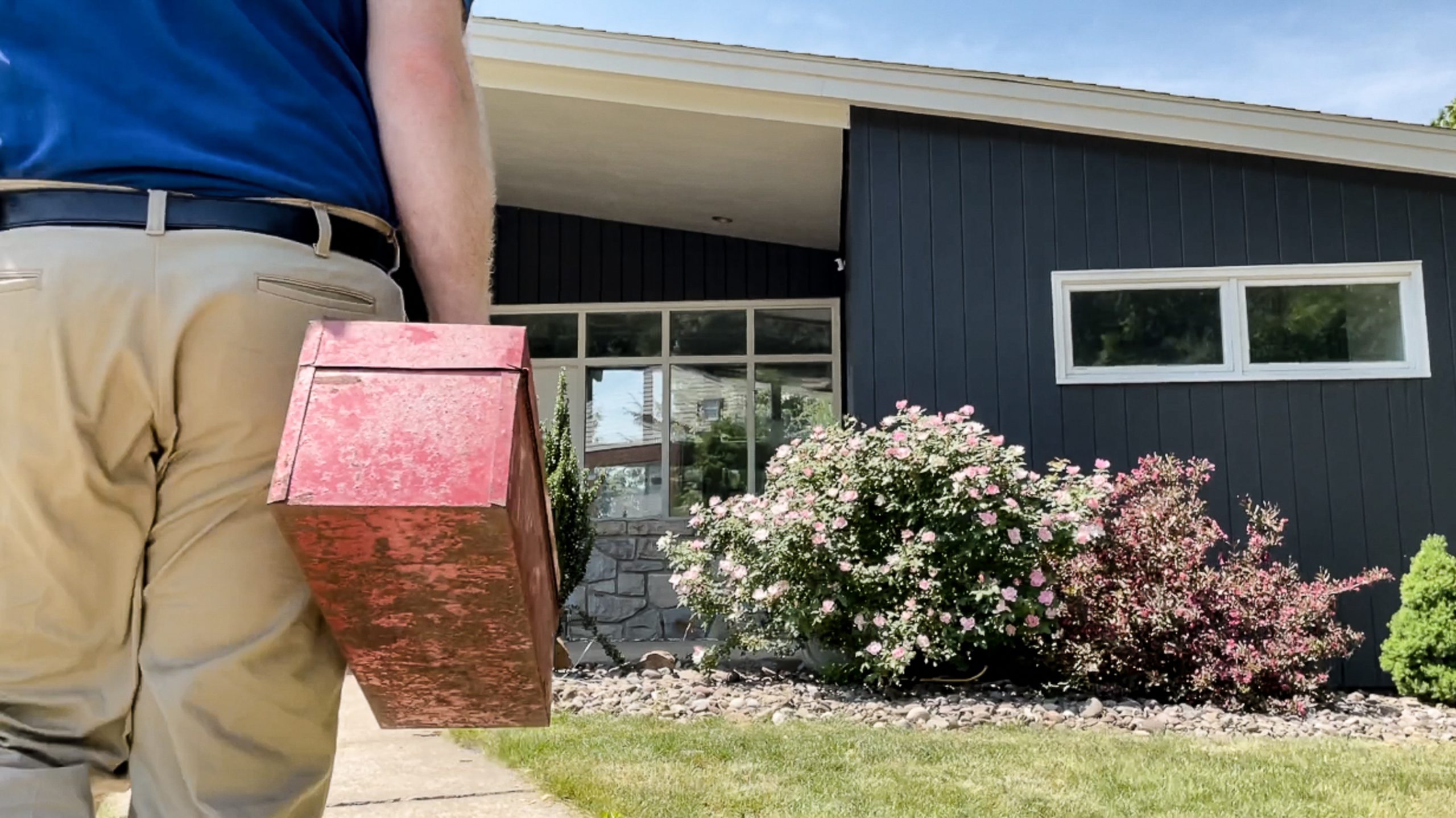 technician arriving at a household for a maintenance plan visit