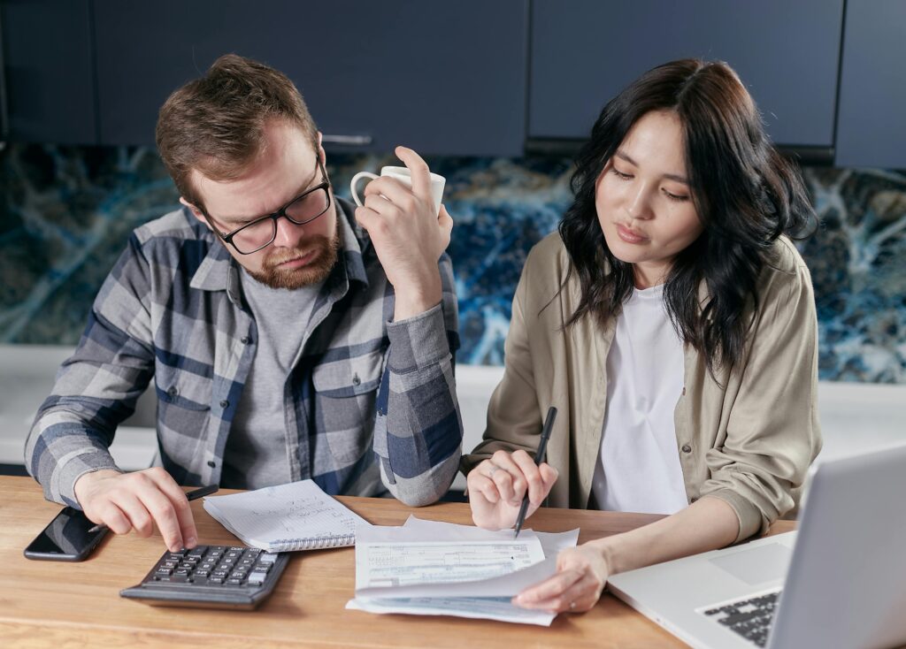 a couple comparing estimates