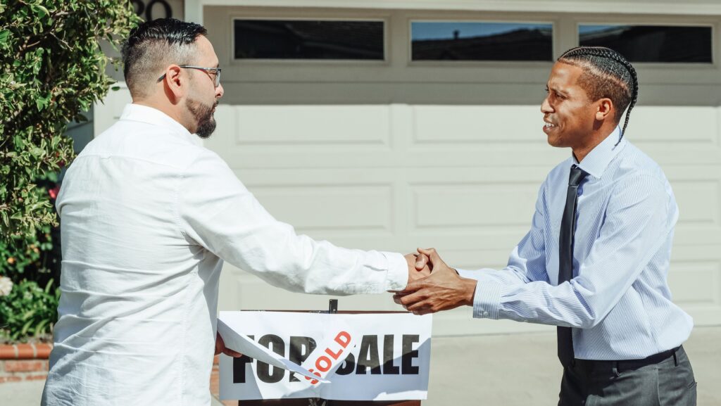 Man making a Sale on a Home